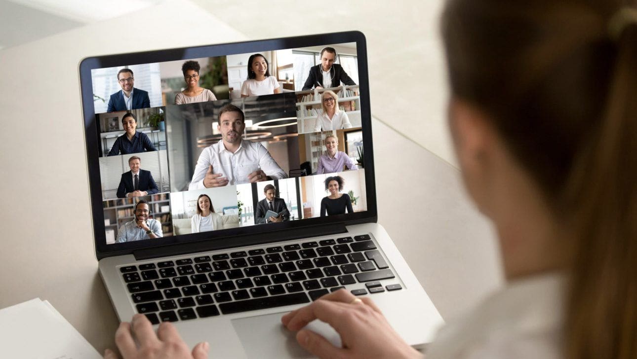 woman on a video call look at laptop