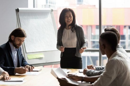 woman speaking during an office meeting