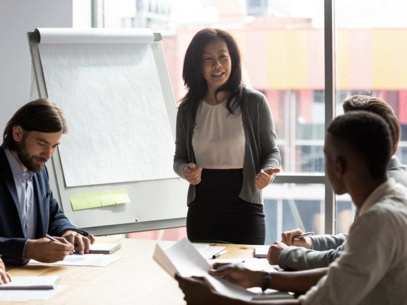 woman speaking during an office meeting