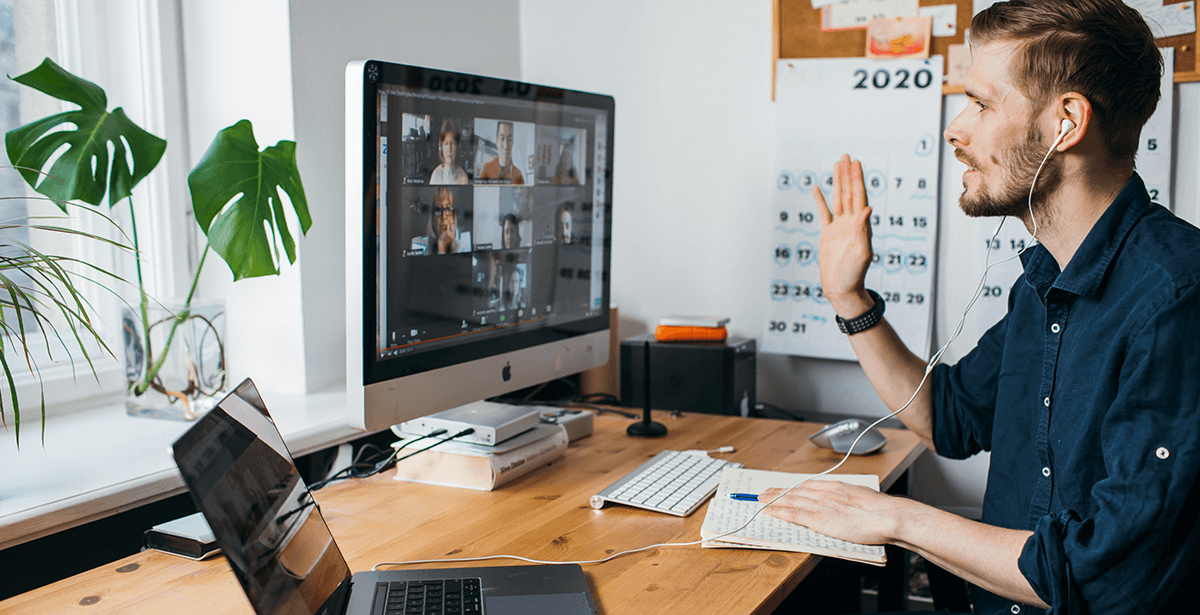 Man waving during Zoom meeting