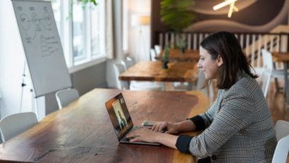 smiling woman at laptop