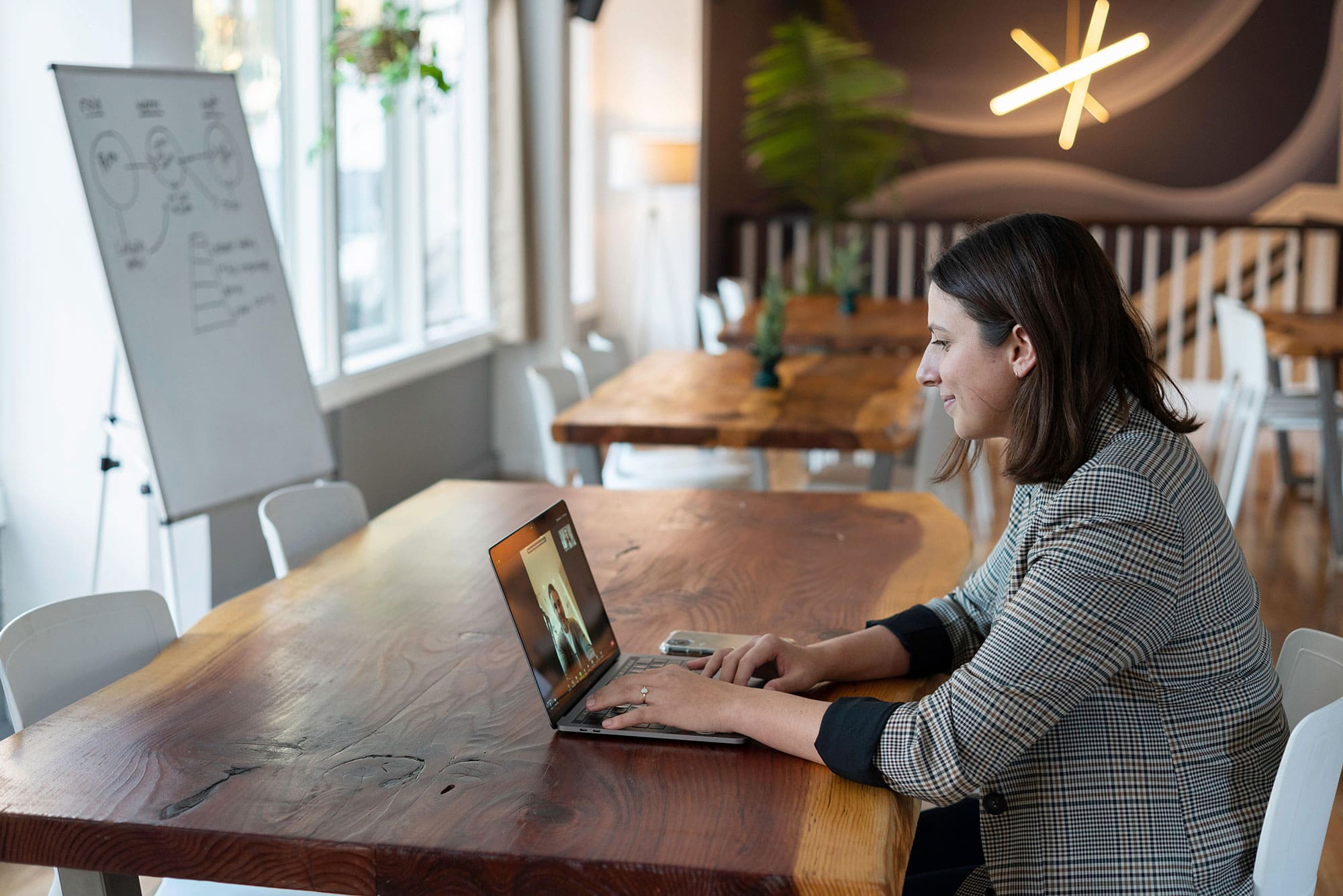 smiling woman at laptop