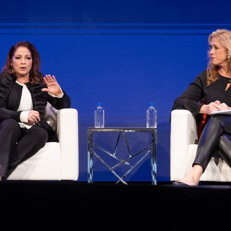 gloria estefan and susan mackenty brady on stage slc44