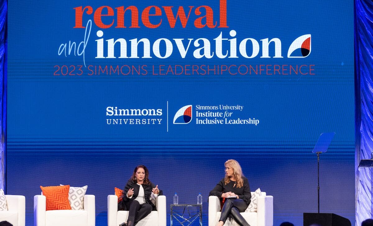 gloria estefan and susan mackenty brady on statge at simmons leadership conference