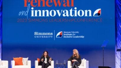 gloria estefan and susan mackenty brady on statge at simmons leadership conference