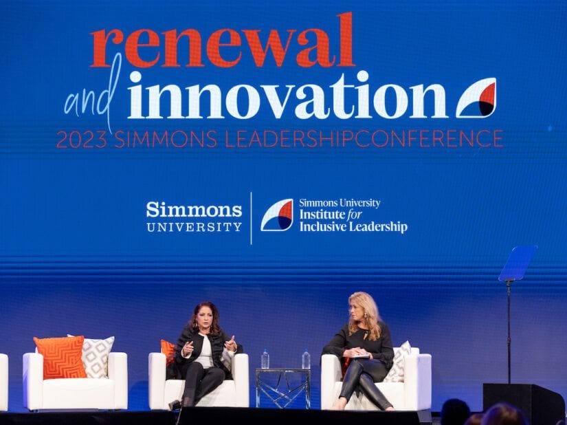 gloria estefan and susan mackenty brady on statge at simmons leadership conference