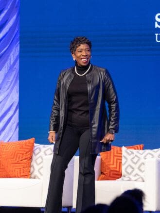 carla harris on stage at the simmons leadership conference