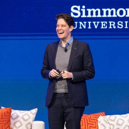 dorie clark on stage at the simmons leadership conference